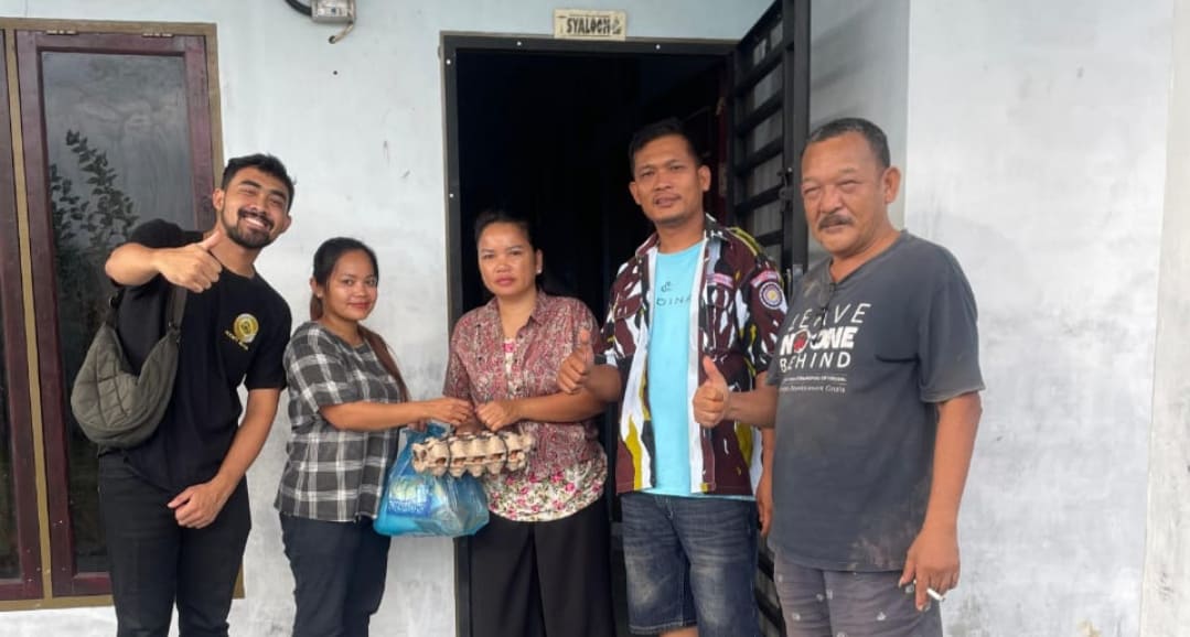 Sambut Natal Dan Tahun Baru, Koin Bar & KTV Salurkan Bingkisan Kepada Warga.